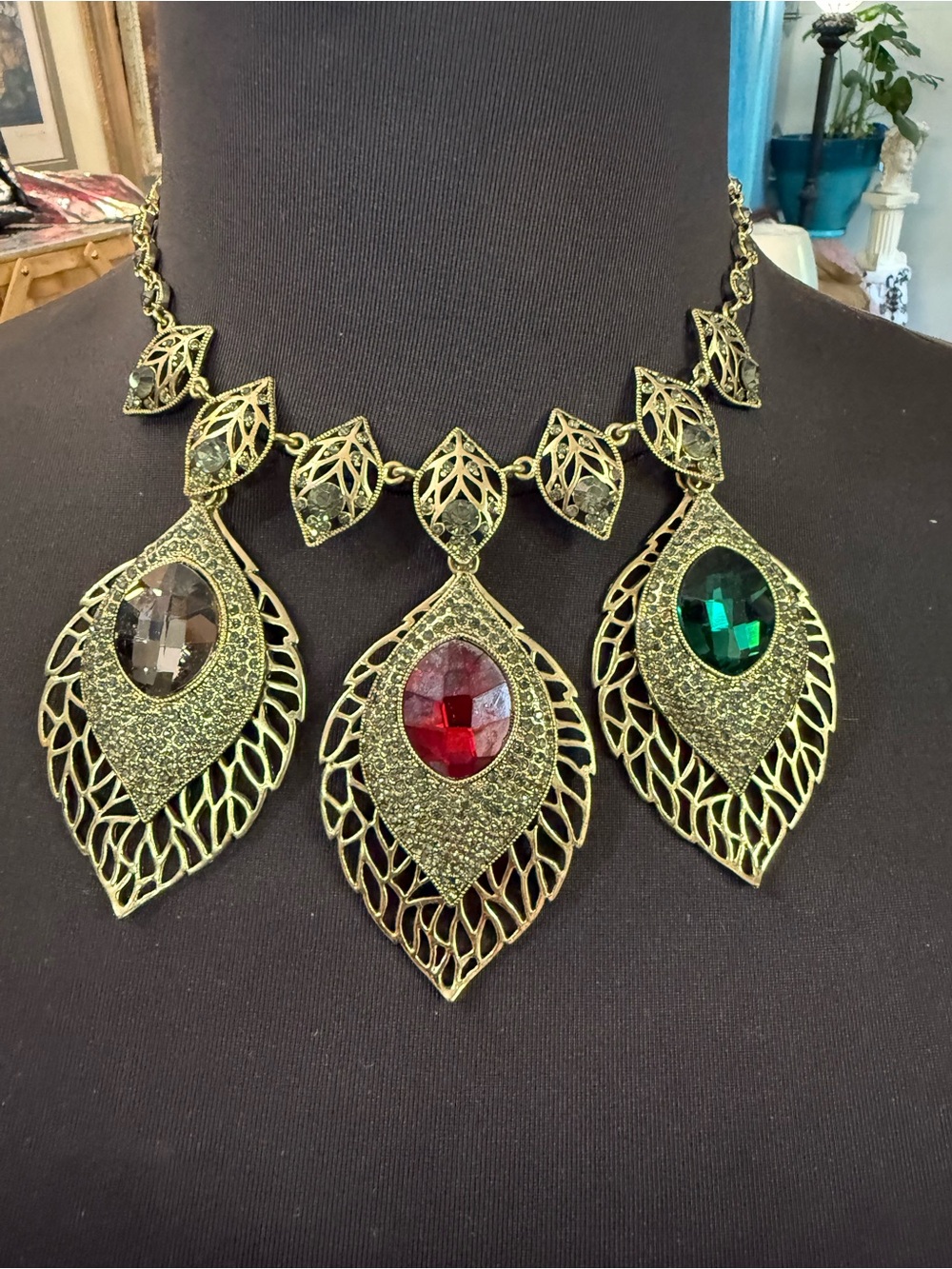 Vintage-Inspired Gold Leaf Statement Necklace with Red, Green, and Smoky Gems